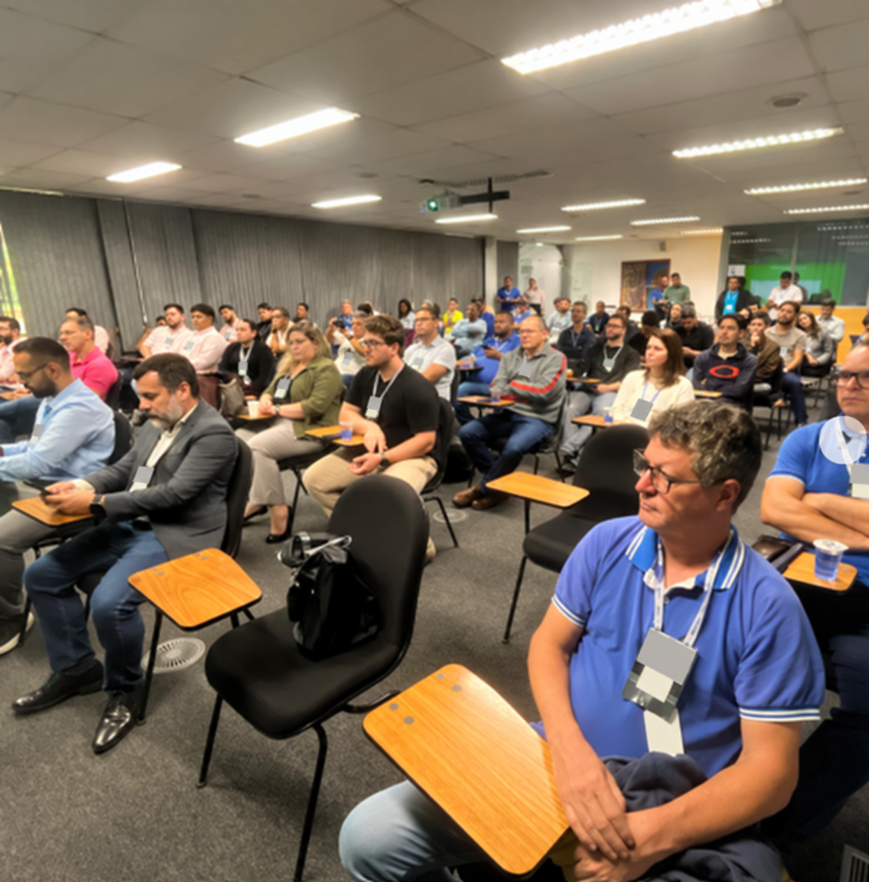 Público em sala de treinamento